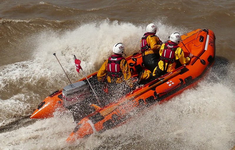 image of rnli life boat on the sea